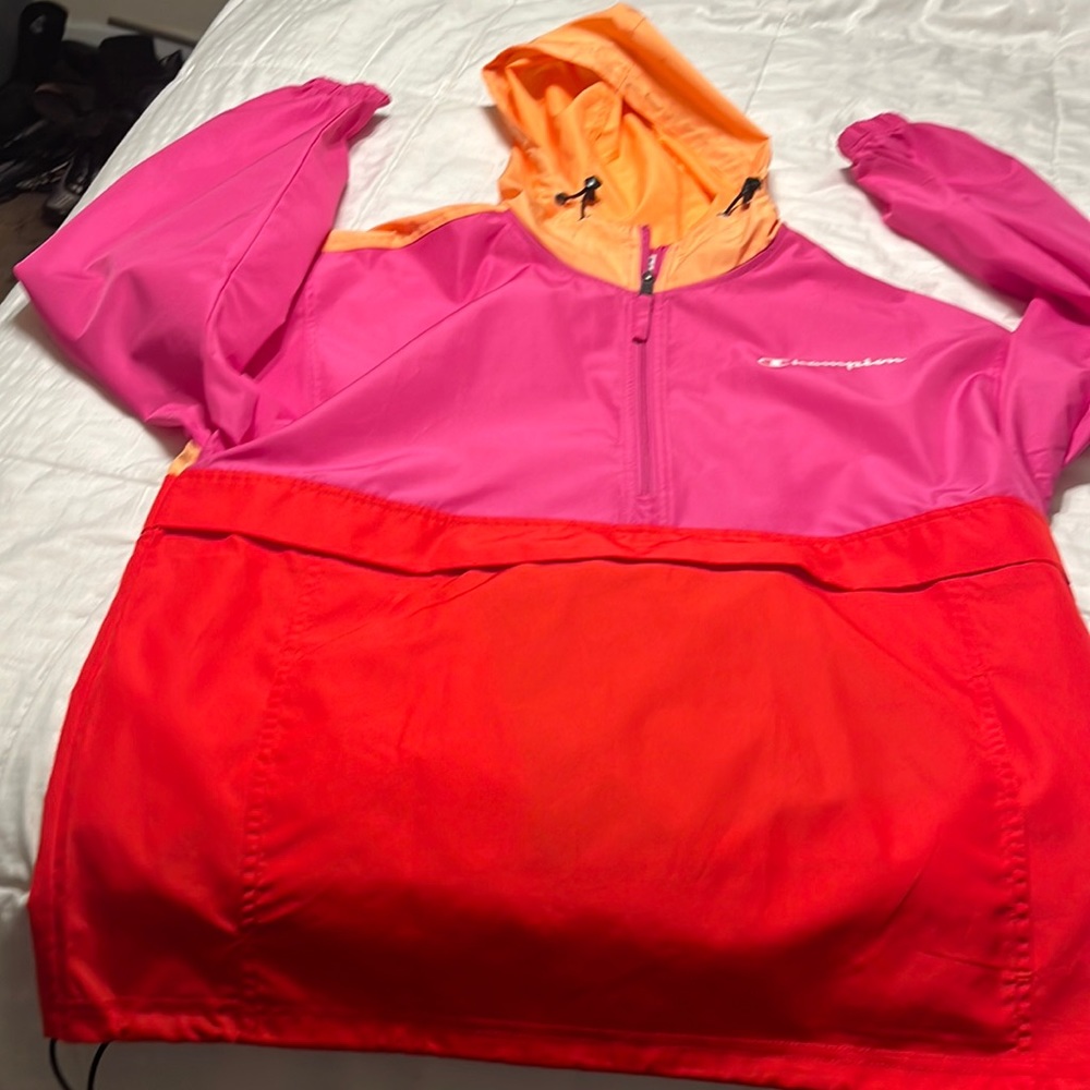 Long Sleeve Reain Jacket with front pouch zipper. Multi Color new no tags